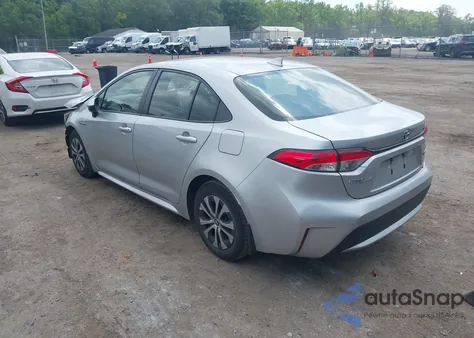 2021 Toyota Corolla Hybrid Le from USA, damaged, VIN JTDEAMDEXMJ022331